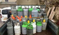 الشرطة تداهم محلين للتجارة باسطوانات الغاز بصورة غير قانونية 